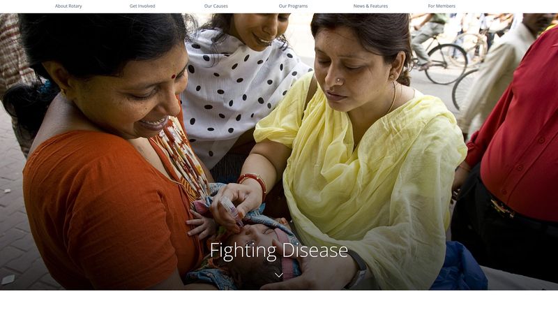 image of two women providing medicine to a baby on nonprofit website Rotary International